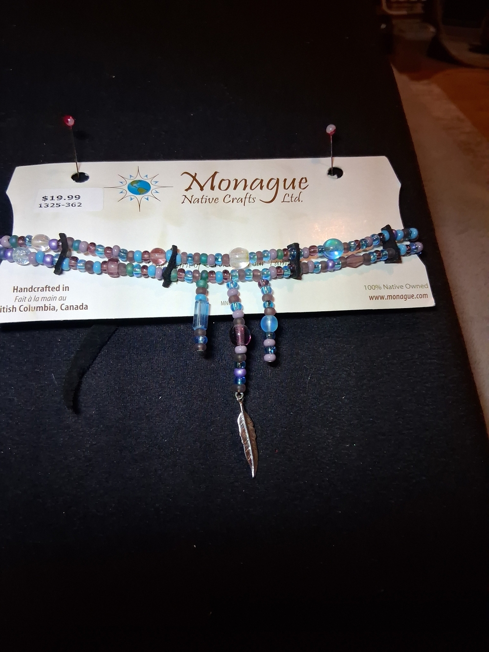 Monague Multi-Strand Choker with Feather Charm